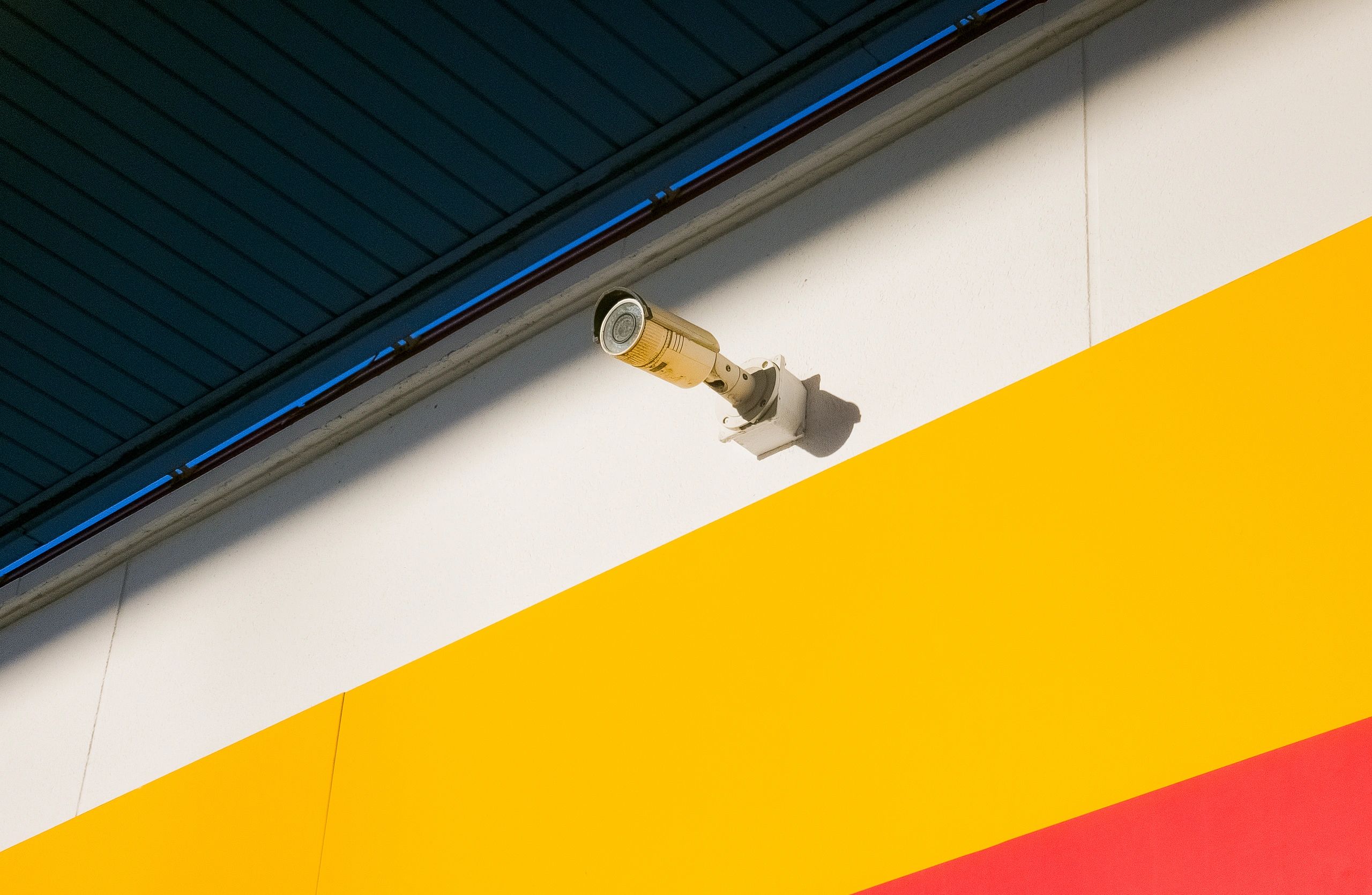 Wall-mounted security camera installed for property monitoring