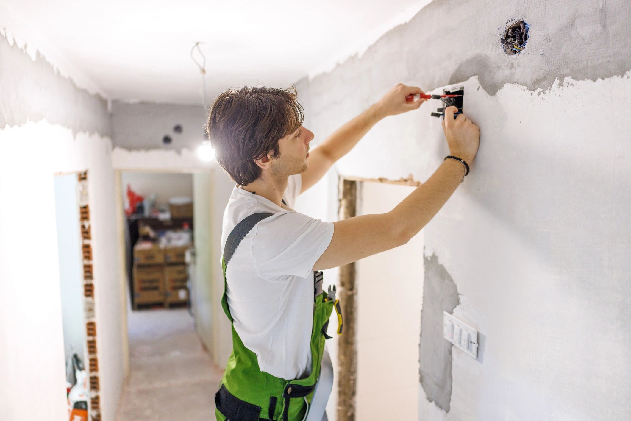 Technician performing installation work onsite